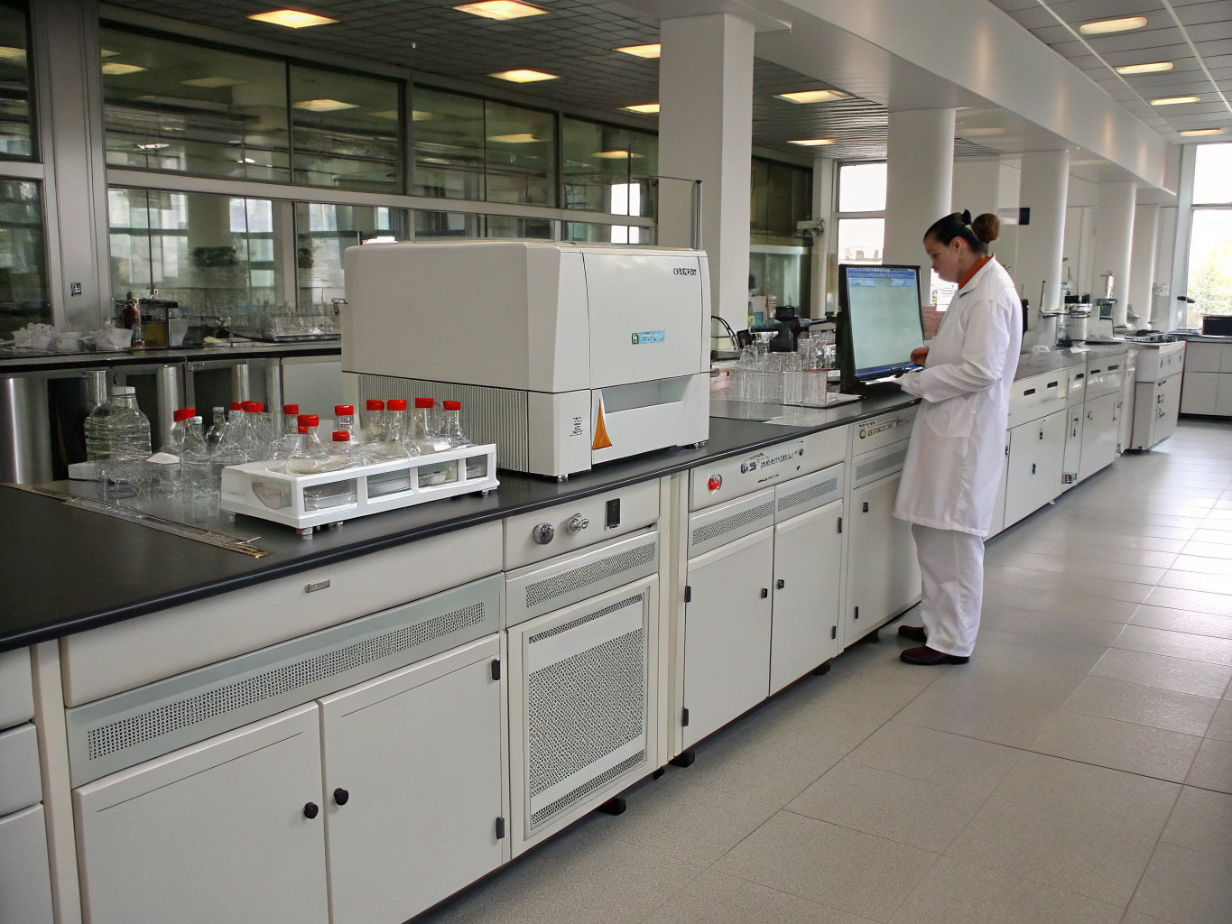 Analytical laboratory equipment and researchers working in academic facility